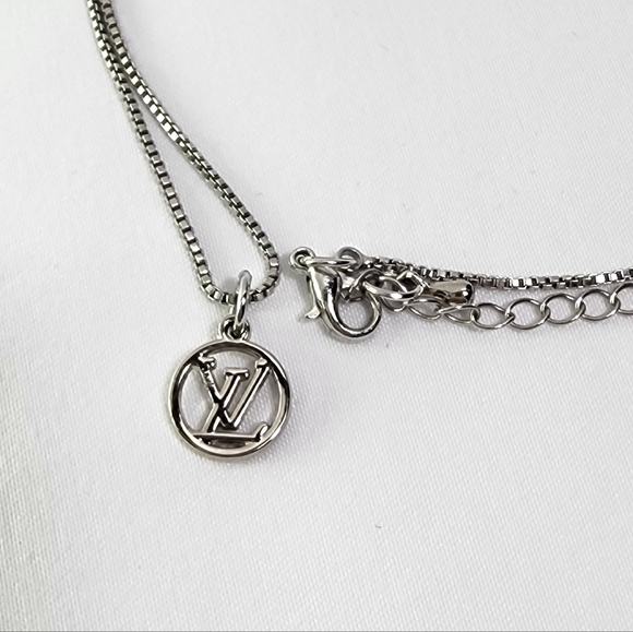 Authentic Louis Vuitton silver petite LV charm on chain - Picture 1 of 8